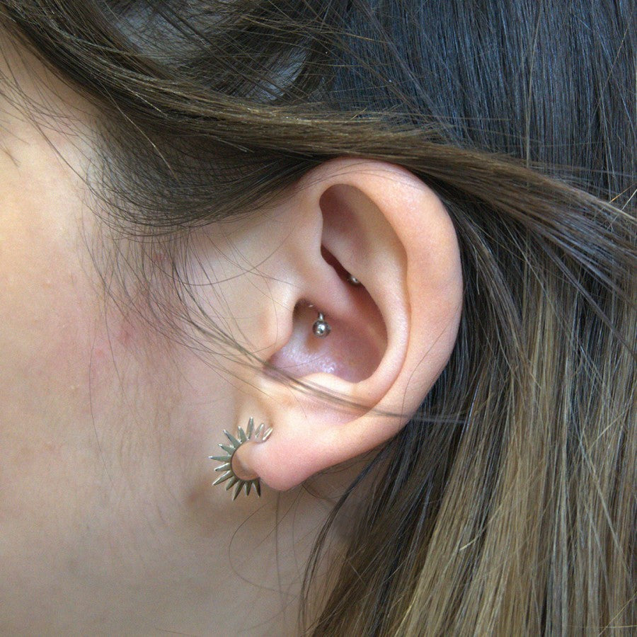 Pendientes de aro con forma de sol